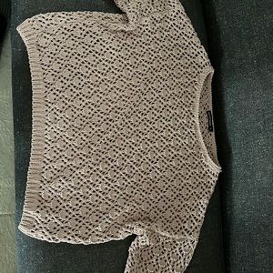 i am selling a over sweater -Never Worn-